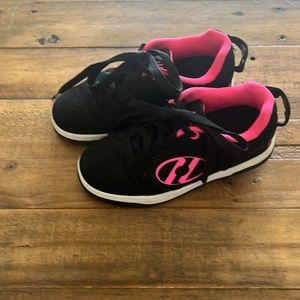 Black and hot pink Heely’s size 2